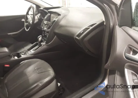 2014 Ford Focus Titanium z USA, uszkodzony, nr VIN 1FADP3N24EL436502